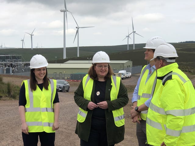 Deputy First Minister Kate Forbes (lef) and SNP candidate for Lothian East Lyn Jardine (right) during a visit to Aikengall Community Wind Farm in East Lothian