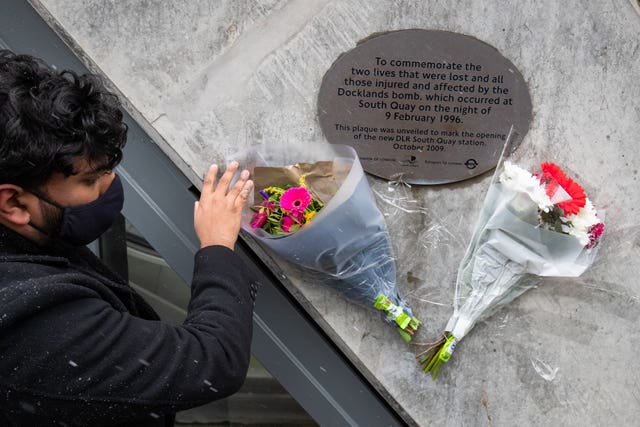 Aazim Ihsan, a victim’s relative, next to a plaque commemorating the attack during the 25th anniversary memorial service of the London Docklands bombing (Aaron Chown/PA