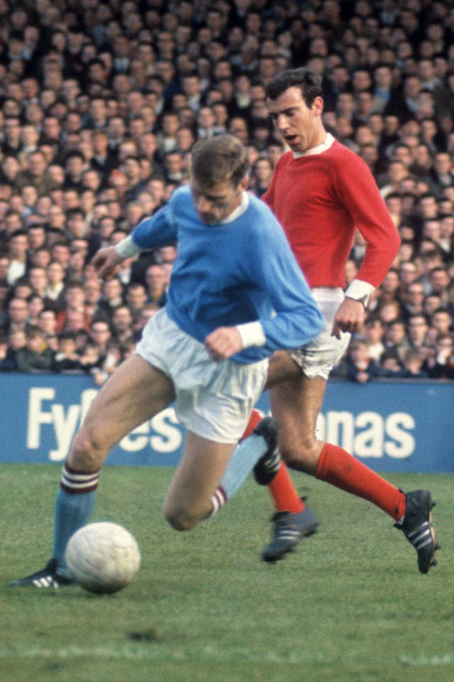 Tony Book in action for Manchester City