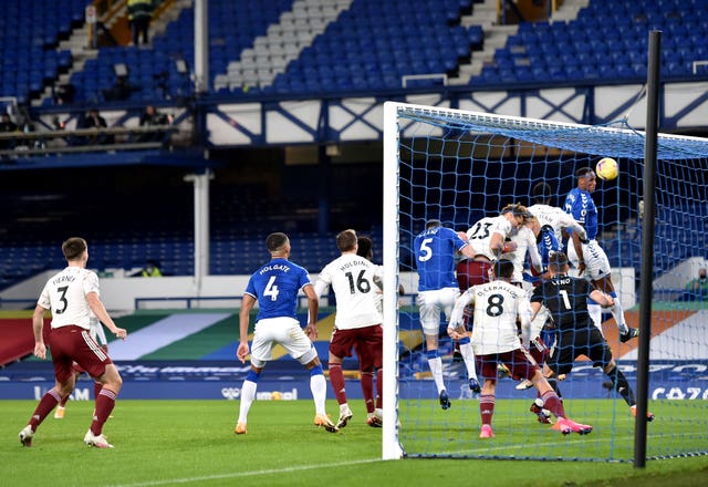 Everton’s Yerry Mina (right) heads the ball to score a goal against Arsenal at Goodison Park