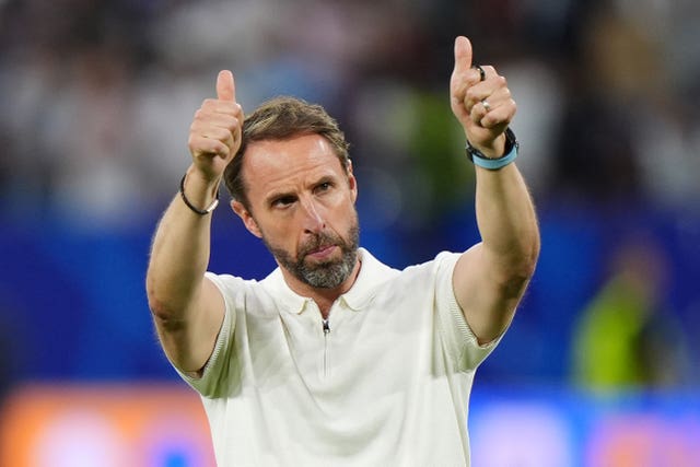 England manager Gareth Southgate puts his thumbs up as he gestures towards the fans after the Euro 2024 win over Slovakia