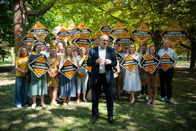 Liberal Democrat leader Sir Ed Davey with campaigners