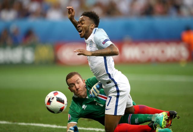 Raheem Sterling is fouled by Hannes Thor Halldorsson to win a penalty against Iceland