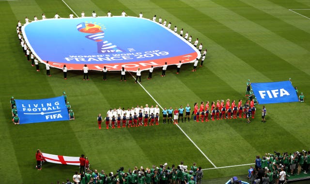 Both teams line up on the pitch ahead of the semi-final