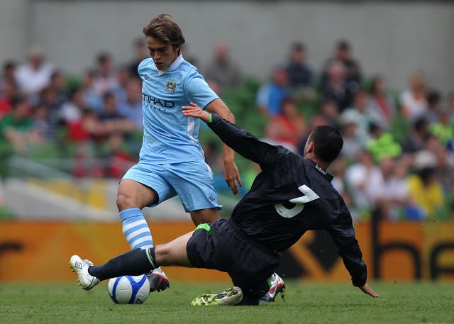 Denis Suarez, left, is a former Manchester City youth player