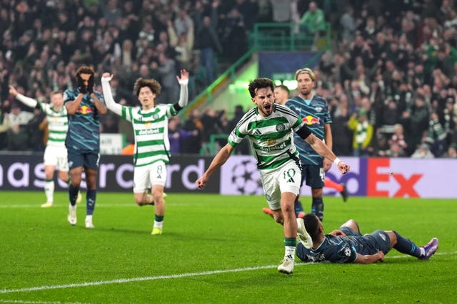 Nicolas Kuhn, centre, celebrates his second goal against Leipzig