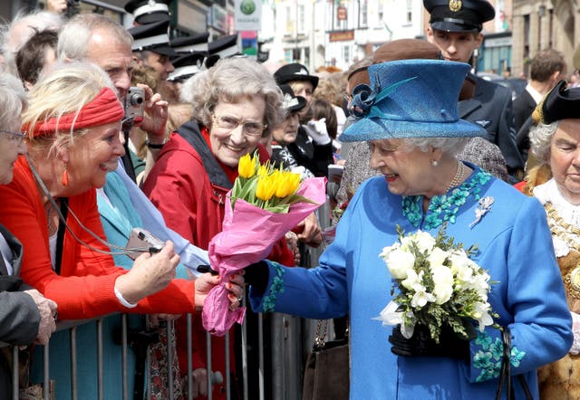the queen visits wales after disaster