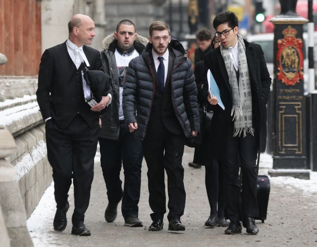 Alfie's father Tom Evans (centre), arriving at the Royal Courts of Justice, London (Yui Mok/PA)