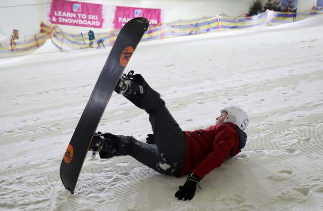 Derek Mackay has snowboarding lesson