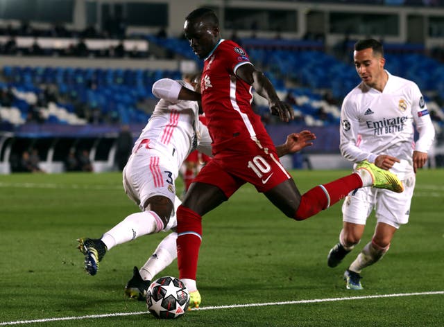 Mane (pictured, centre), Alexander-Arnold and Keita all played in Tuesday's loss to Real Madrid (Isabel Infantes/PA).