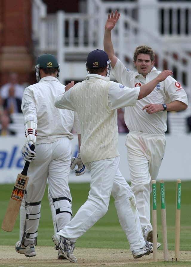 James Anderson (right) celebrates one of his five wickets on his Test debut