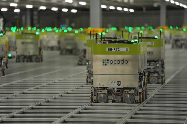 Automated picking machines at an Ocado distribution warehouse 