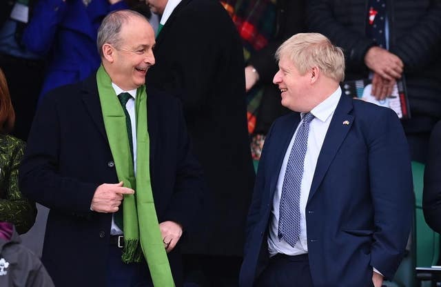 Taoiseach Micheal Martin with Prime Minister Boris Johnson in the stands ahead of a Guinness Six Nations match during his visit to the UK