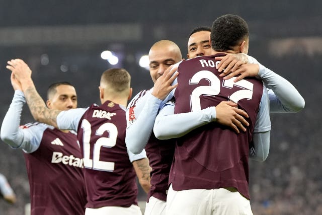 Jacob Ramsey, second right, celebrates scoring the first goal at Villa Park