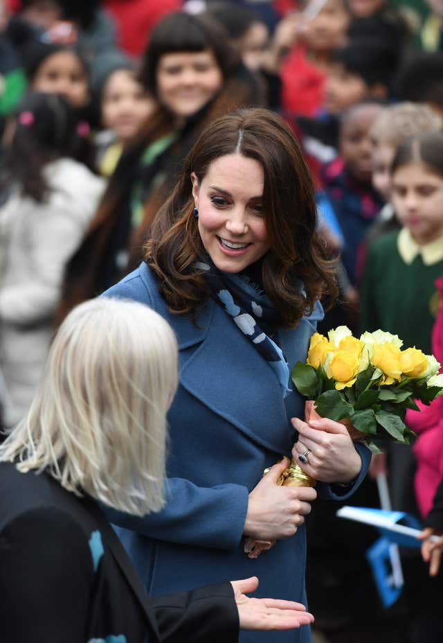 Receiving the royal bouquet (Joe Giddens/PA)