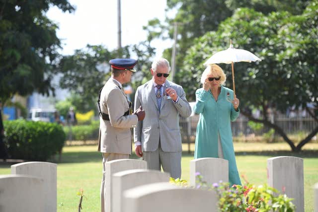 Charles and Camilla also paid their respects to fallen soldiers during a visit to a Commonwealth War Graves Commission cemetery. Joe Giddens/PA Wire