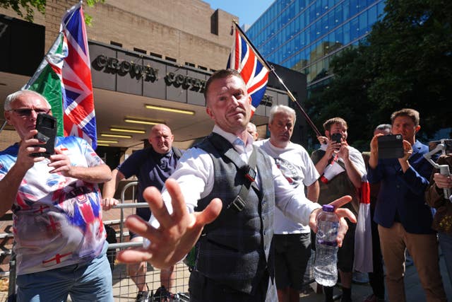 Tommy Robinson leaving Southwark Crown Court