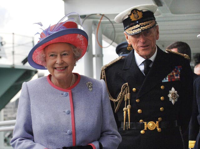 The duke, in his Naval uniform, with the Queen