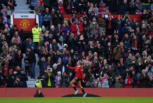 Alessia Russo celebrates scoring United's third 
