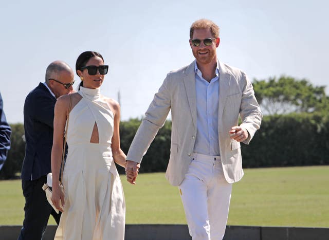 The Duke and Duchess of Sussex during the Royal Salute Polo Challenge, to benefit Sentebale, at the USPA National Polo Centre in Wellington, Florida, in 2024