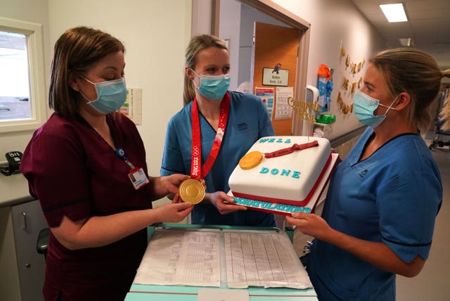 Vicky Wright shows off her medal