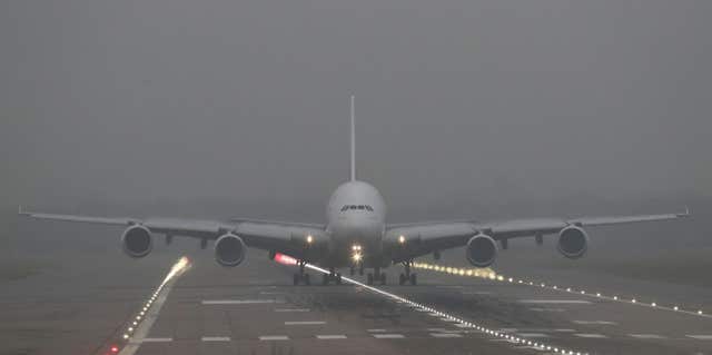 A plane lands at Gatwick