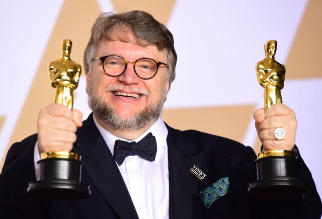 Guillermo Del Toro with his Oscars for The Shape of Water in 2018.
