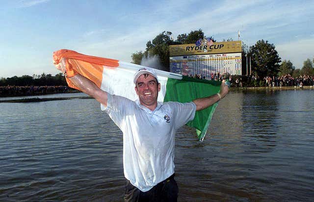 Paul McGinley celebrates after his putt won the 34th Ryder Cup for Europe in 2002. The match was cancelled in 2001 after the September 11 terrorist attacks with the biennial event changing to even-numbered years thereafter