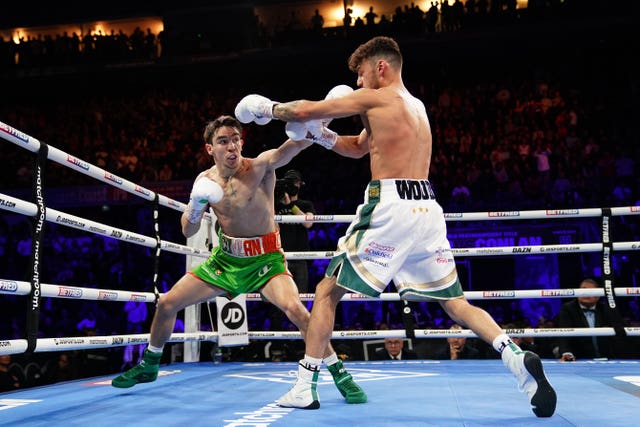 Michael Conlan (left) in action against Leigh Wood in their WBA Featherweight World Title contest at the Motorpoint Arena, Nottingham