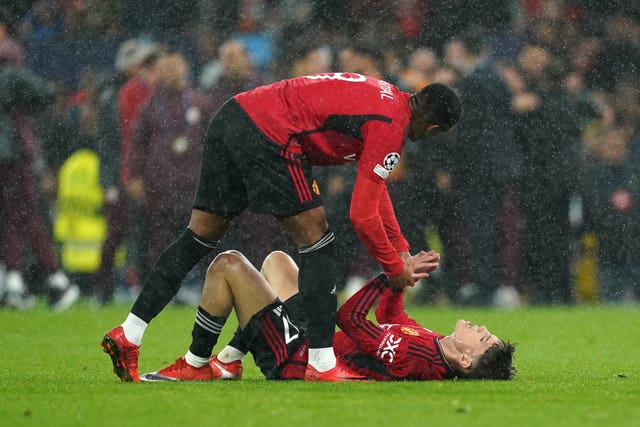 Alejandro Garnacho (right) is consoled by team-mate Anthony Martial following the loss to Galatasaray 