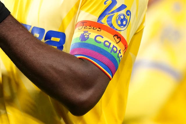 Close up of Crystal Palace’s Marc Guehi wearing the adapted rainbow armband against Ipswich