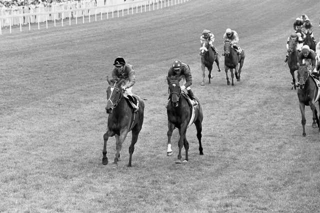 Dunfermline (left) wins the Oaks at Epsom