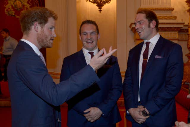 Alun Wyn Jones and Wales team-mate Gethin Jenkins, centre, meet Prince Harry, left