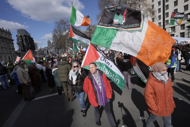 People take part in a pro-Palestine march in central London