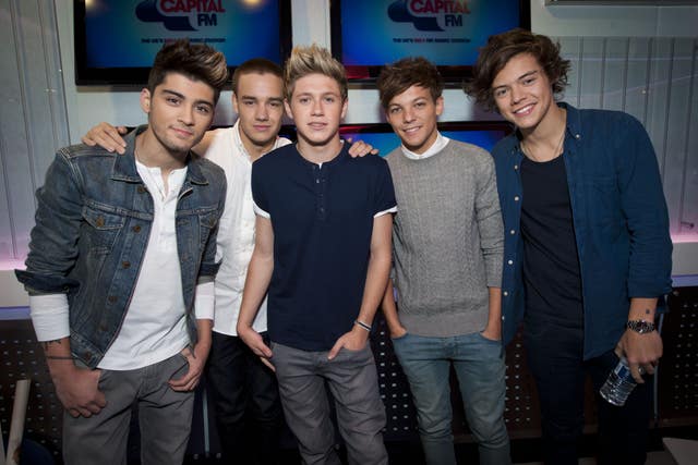 Zayn Malik, Liam Payne, Niall Horan, Louis Tomlinson and Harry Styles pictured during an interview on Capital Breakfast with Dave Berry and Lisa Snowdon in 2012