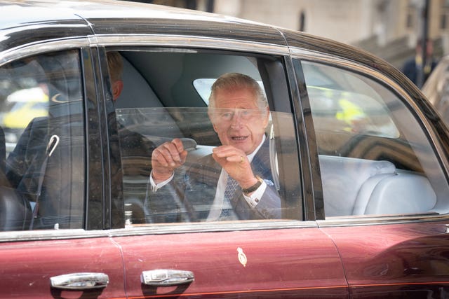 Charles leaving Westminster Abbey in central London on Wednesday after a rehearsal for his coronation
