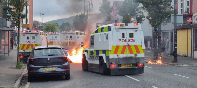 PSNI officers man road blocks in Belfast following an anti-Islamic protest outside Belfast City Hall 