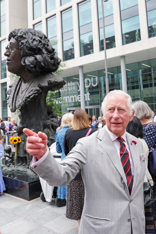 Charles visits the statue of Betty Campbell