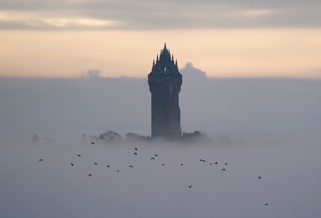 The Wallace Monument surrounded by mist