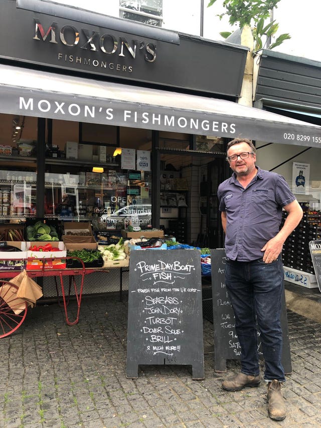 Robin Moxon with one of his 'prime day boat' signs