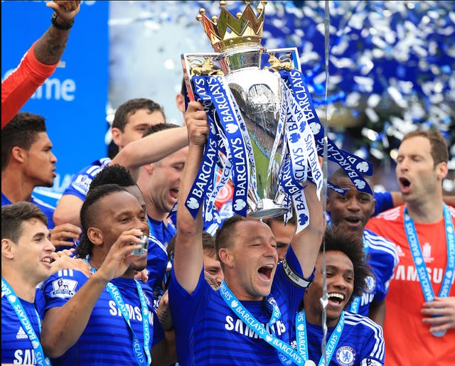 John Terry lifts the Premier League trophy