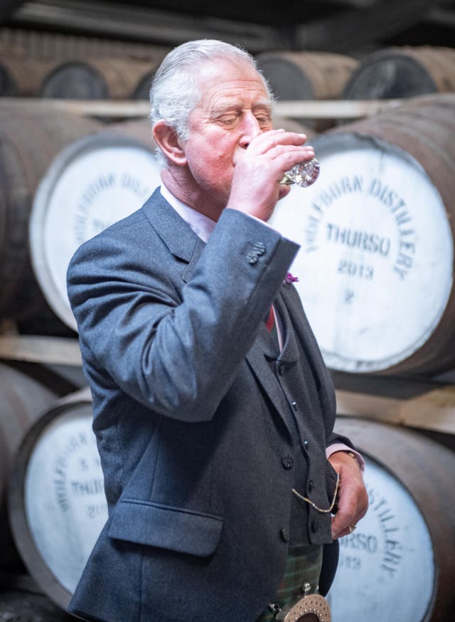 Prince Charles drinking whisky