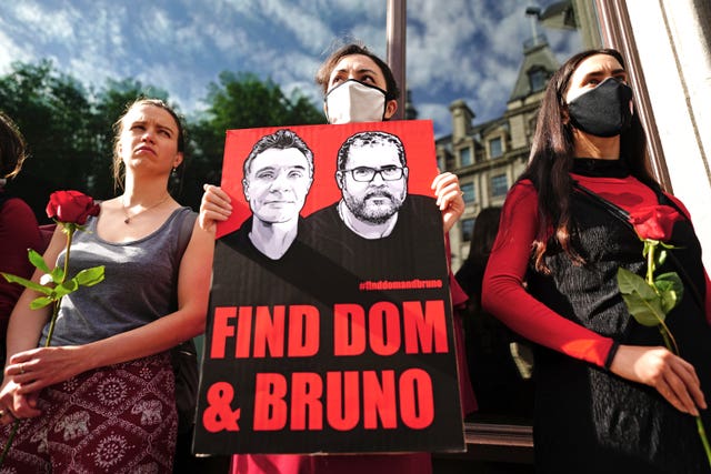 People take part in a vigil outside the Brazilian Embassy in London for Dom Phillips and Bruno Araujo Pereira 