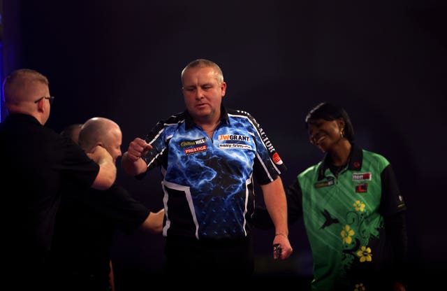 Andy Boulton celebrates his win over Deta Hedman at the WilliamHill PDC World Darts Championship