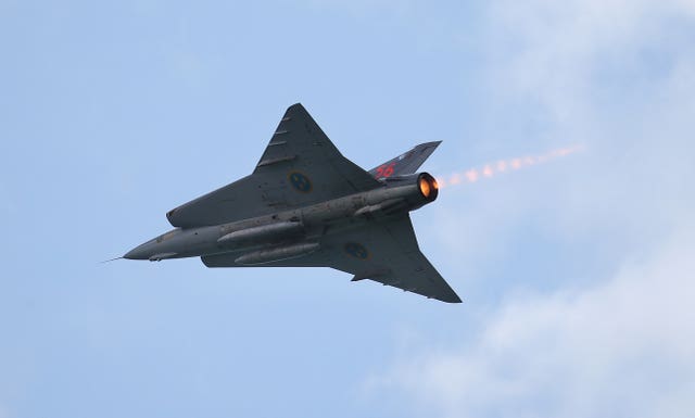The Saab 35 Draken performs for the crowds on day one of the Bournemouth Air Festival 