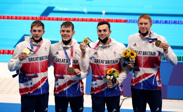 Matthew Richards, third left, won Olympic gold in the men's 4x200 freestyle relay in Tokyo three years ago