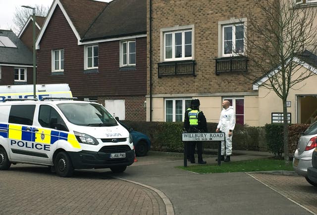 Police outside the address in Farnham 