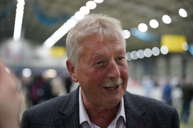 Headshot of Sammy Wilson smiling