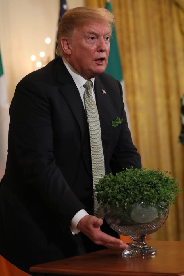 US president Donald Trump with a bowl of shamrock, presented by taoiseach Leo Varadkar, in 2019