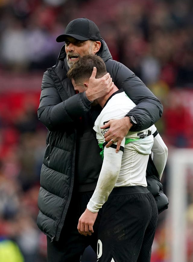 Liverpool manager Jurgen Klopp embraces Alexis Mac Allister after Sunday's 2-2 draw at Old Trafford